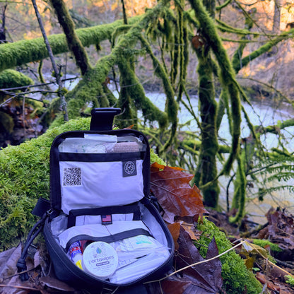 Traverse Lightweight Backcountry First Aid Kit in mossy PNW forest | Cascade First Aid