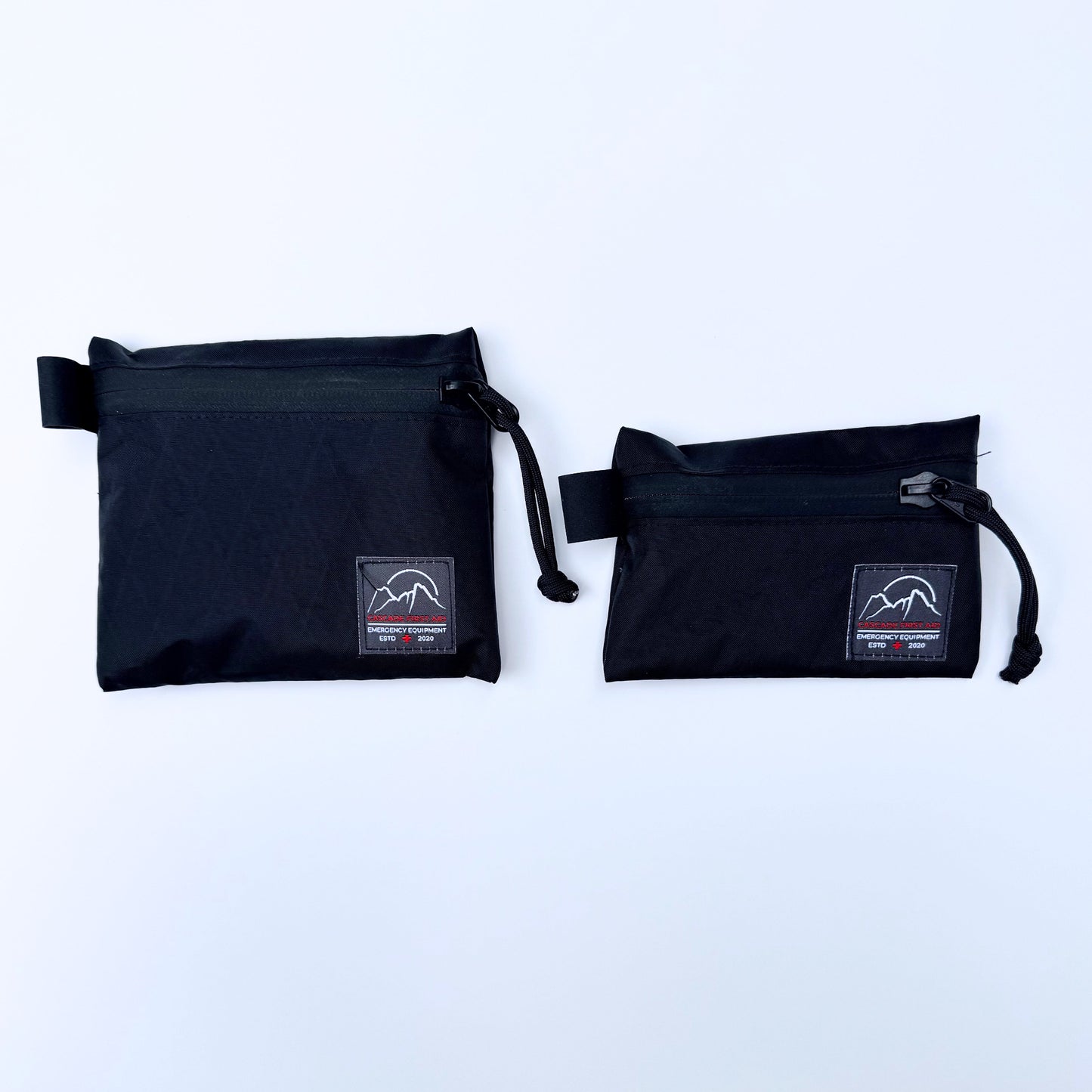 Small and medium Bits bags side by side. Ultralight, highly weather-resistant Xpac construction. From Cascade First Aid