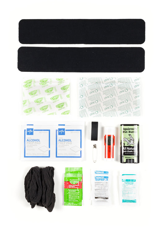 Ultralight Frick!tion Kit contents laid flat – blister kit for trail runners and cyclists